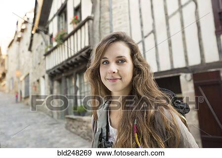 Caucasian woman posing in city View Large Photo Image Stock Photo - Caucasian woman posing in city. Fotosearch