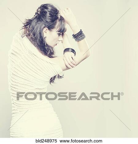 Stock Photography - Caucasian woman wearing ribbed dress. Fotosearch