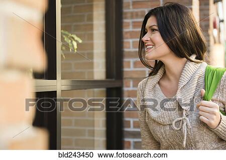 Caucasian woman window shopping View Large Photo Image Stock Image - Caucasian woman window shopping. Fotosearch