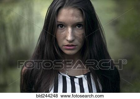 Caucasian woman with dirt on face View Large Photo Image Stock Photo - Caucasian woman with dirt on face. Fotosearch