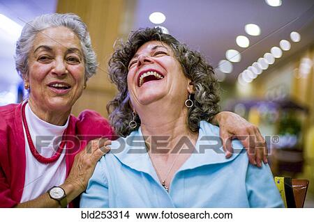 Caucasian women laughing View Large Photo Image Picture - Caucasian women laughing. Fotosearch