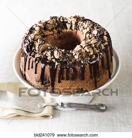 Chocolate icing on cake View Large Photo Image Stock Photo - Chocolate icing on cake. Fotosearch