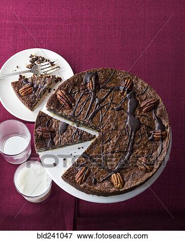 Chocolate pecan fudge tart and milk View Large Photo Image Stock Photo - Chocolate pecan fudge tart and milk. Fotosearch