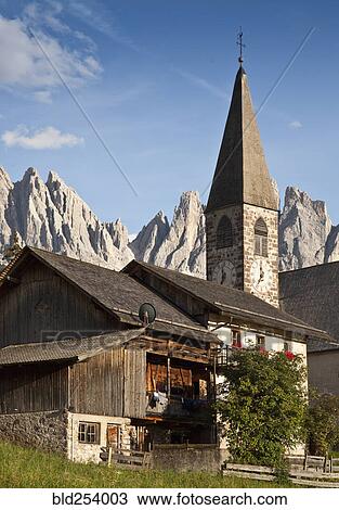 Church in mountain landscape, Funes, Trentino Alto Adige, Italy View Large Photo Image Stock Image - Church in mountain landscape, Funes, Trentino Alto Adige, Italy. Fotosearch