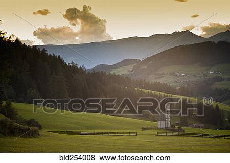 Stock Photo - Church in remote mountain landscape, Funes, Trentino Alto Adige, Italy. Fotosearch