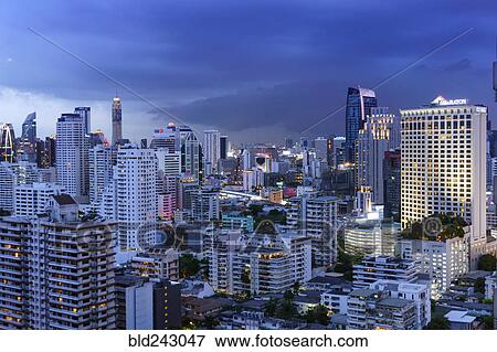 Stock Photo - "Cityscape at dusk, Bangkok, Thailand". Fotosearch