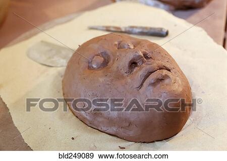 Clay mask in art studio View Large Photo Image Stock Photo - Clay mask in art studio. Fotosearch