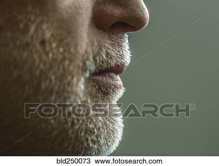 Stock Image - Close up of chin and beard of Caucasian man. Fotosearch