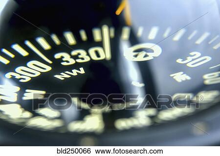 Stock Photograph - Close up of compass. Fotosearch