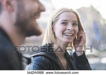 Stock Photo - Close up of laughing Caucasian couple. Fotosearch