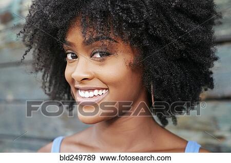 Stock Photo - Close up of smiling Black woman. Fotosearch