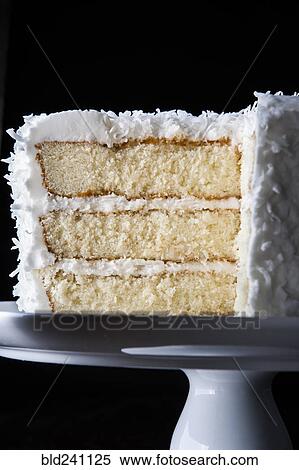 Coconut cake on tray missing slice View Large Photo Image Stock Photography - Coconut cake on tray missing slice. Fotosearch