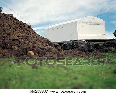 Coffin waiting near grave View Large Photo Image Stock Photo - Coffin waiting near grave. Fotosearch