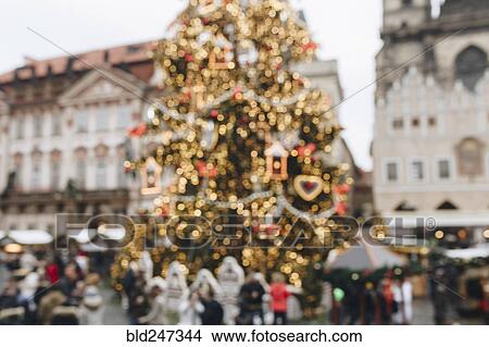 Crowd near Christmas tree outdoors View Large Photo Image Picture - Crowd near Christmas tree outdoors. Fotosearch