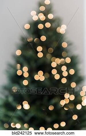 Stock Photography - Defocused Christmas tree. Fotosearch