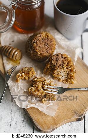 Dessert cakes with honey and coffee View Large Photo Image Stock Image - Dessert cakes with honey and coffee. Fotosearch