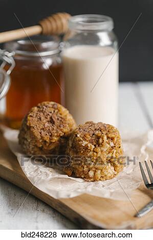 Dessert cakes with milk and honey View Large Photo Image Stock Photo - Dessert cakes with milk and honey. Fotosearch