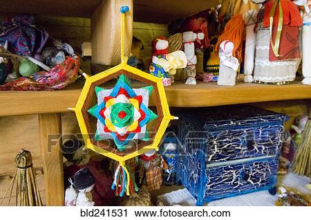 Dreamcatcher hanging on shelf View Large Photo Image Stock Image - Dreamcatcher hanging on shelf. Fotosearch