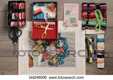Stock Photograph - Embroidery supplies on table. Fotosearch