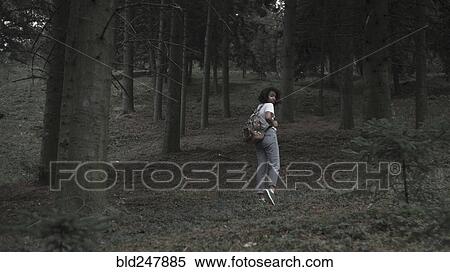 Fearful woman running in woods View Large Photo Image Stock Photography - Fearful woman running in woods. Fotosearch