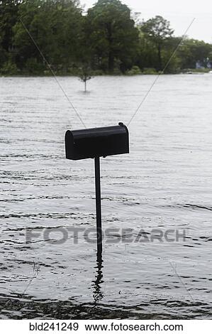 Stock Photo - Flooding around mailbox. Fotosearch