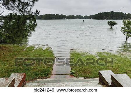 Flooding at bottom of staircase outdoors View Large Photo Image Stock Photograph - Flooding at bottom of staircase outdoors. Fotosearch
