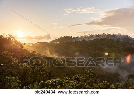 Fog on mountains at sunset View Large Photo Image Picture - Fog on mountains at sunset. Fotosearch
