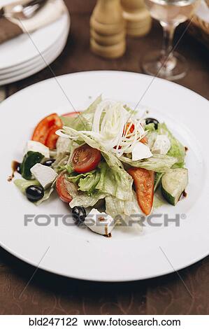 Stock Image - Fresh salad on plate. Fotosearch