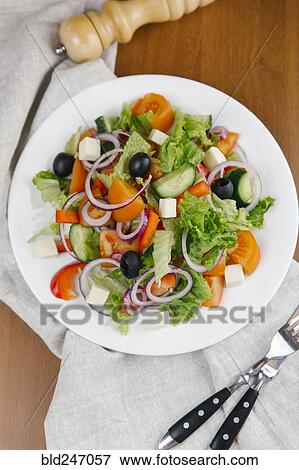 Stock Photo - Fresh salad on plate. Fotosearch