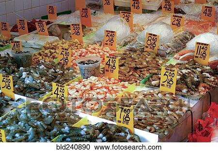 Stock Image - Fresh seafood on ice at market. Fotosearch