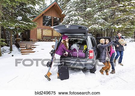 Friends posing for cell phone selfie near car in winter View Large Photo Image Stock Photography - Friends posing for cell phone selfie near car in winter. Fotosearch