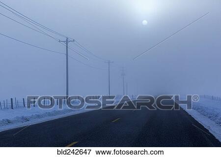 Full moon over road in winter View Large Photo Image Stock Photo - Full moon over road in winter. Fotosearch