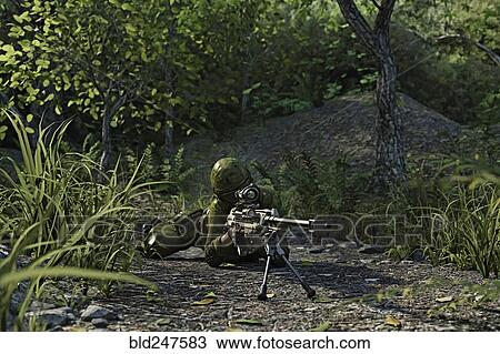 Stock Image - Futuristic soldier laying on the ground aiming rifle. Fotosearch