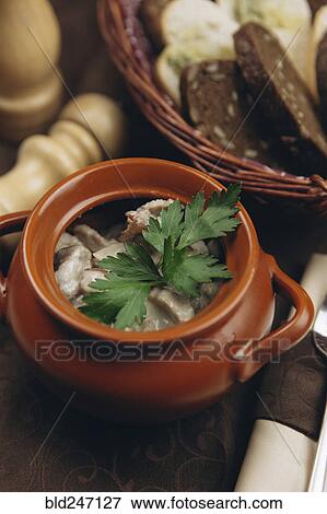 Garnish in cup of soup View Large Photo Image Stock Photo - Garnish in cup of soup. Fotosearch