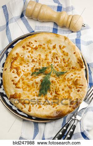 Garnish on bread with melted cheese View Large Photo Image Stock Photo - Garnish on bread with melted cheese. Fotosearch