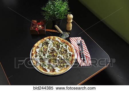 Gourmet pizza on plate View Large Photo Image Stock Photography - Gourmet pizza on plate. Fotosearch