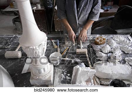 Hands of Caucasian sculptor holding tools View Large Photo Image Stock Image - Hands of Caucasian sculptor holding tools. Fotosearch