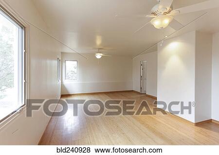 Hardwood floor in empty white room View Large Photo Image Stock Photo - Hardwood floor in empty white room. Fotosearch