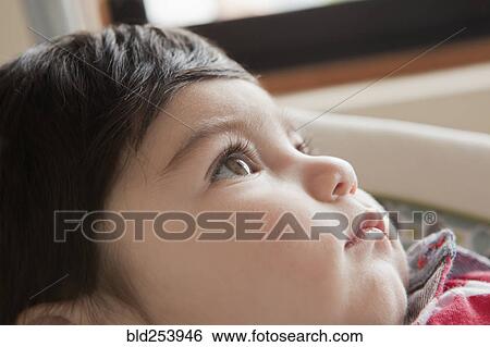 Hispanic baby boy looking up View Large Photo Image Stock Photograph - Hispanic baby boy looking up. Fotosearch