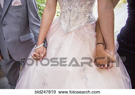 Hispanic boy and girls holding hands View Large Photo Image Stock Photo - Hispanic boy and girls holding hands. Fotosearch