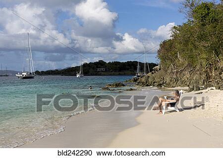 Hispanic woman relaxing on tropical beach View Large Photo Image Stock Image - Hispanic woman relaxing on tropical beach. Fotosearch