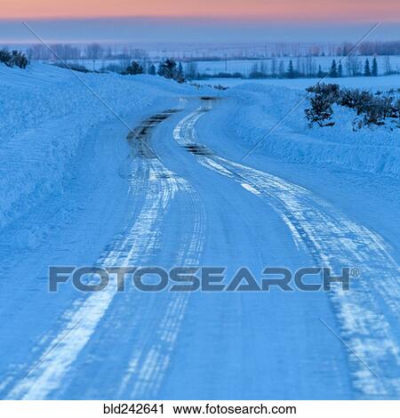 Ice on winding road in winter View Large Photo Image Stock Image - Ice on winding road in winter. Fotosearch