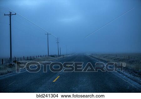 Icy two-lane road View Large Photo Image Picture - Icy two-lane road. Fotosearch