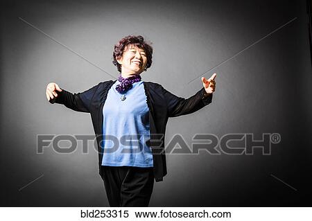 Stock Photography - Japanese woman dancing. Fotosearch