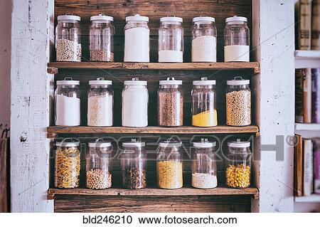Jars of ingredients on wooden shelves View Large Photo Image Stock Image - Jars of ingredients on wooden shelves. Fotosearch