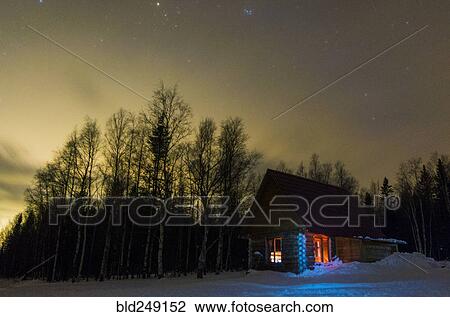 Light glowing in remote cabin in winter View Large Photo Image Stock Image - Light glowing in remote cabin in winter. Fotosearch