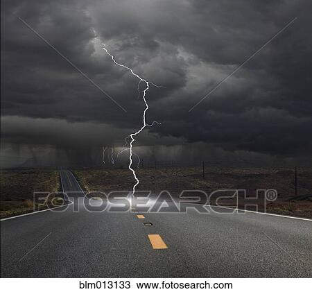 Lightning hitting remote road View Large Photo Image Stock Image - Lightning hitting remote road. Fotosearch