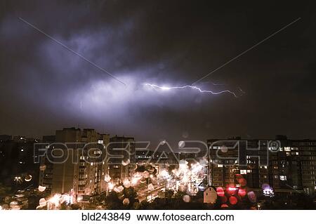 Lightning striking city at night View Large Photo Image Stock Photo - Lightning striking city at night. Fotosearch