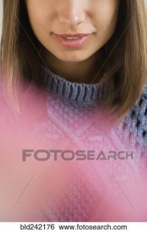 Lips of Mixed Race woman wearing blue sweater View Large Photo Image Stock Photograph - Lips of Mixed Race woman wearing blue sweater. Fotosearch
