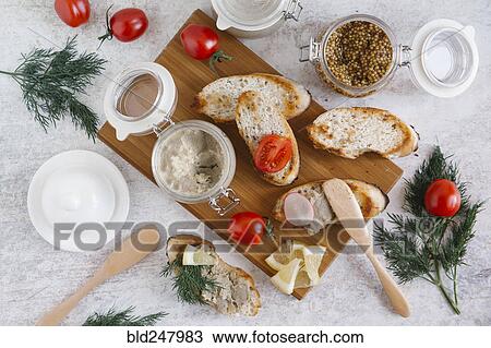 Liver paste and bread on cutting board View Large Photo Image Stock Image - Liver paste and bread on cutting board. Fotosearch